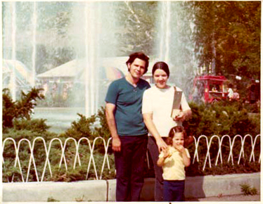 To the left of the man in this 1973 photo, behind the spray of the Bamberger Fountain, the multi-colored umbrella of The Tumbler is visible. Photo: Laura Moncur, Starling Travel (color corrected)