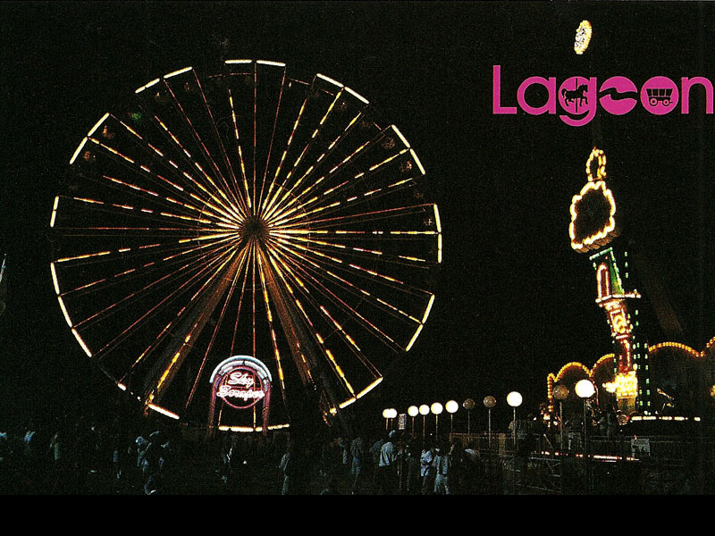 1990s postcard showing Sky Scraper and Flying Carpet.