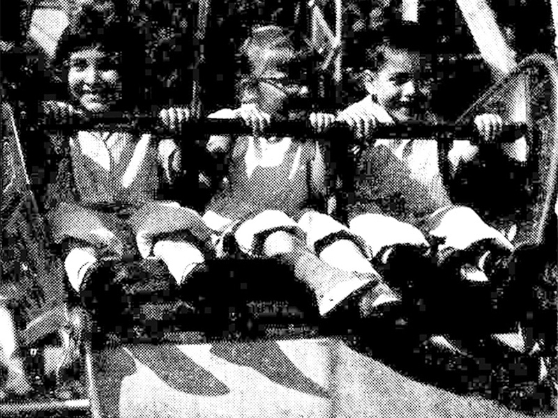 Kathy, Ann & Roy Heath on the Ferris Wheel in 1957. Photo: Hill Top Times