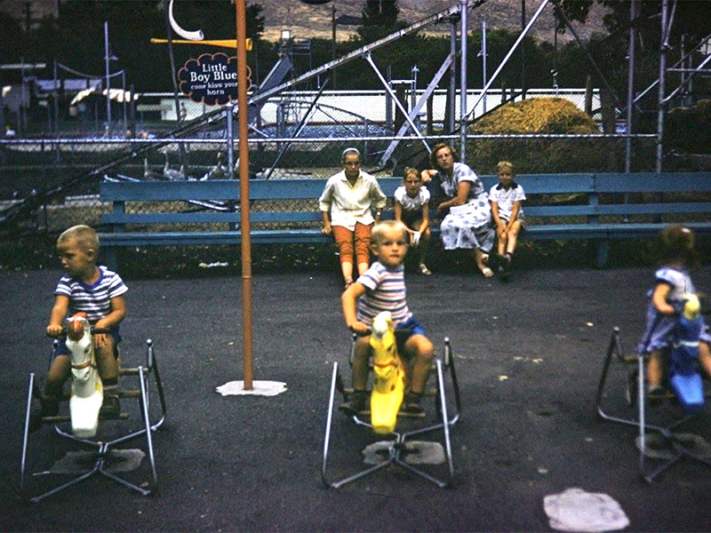Rocking horses in front of the Kiddie Coaster in the '60s. Little Boy Blue's Haystack is visible in the middle of the coaster. Photo: Paige Crandall