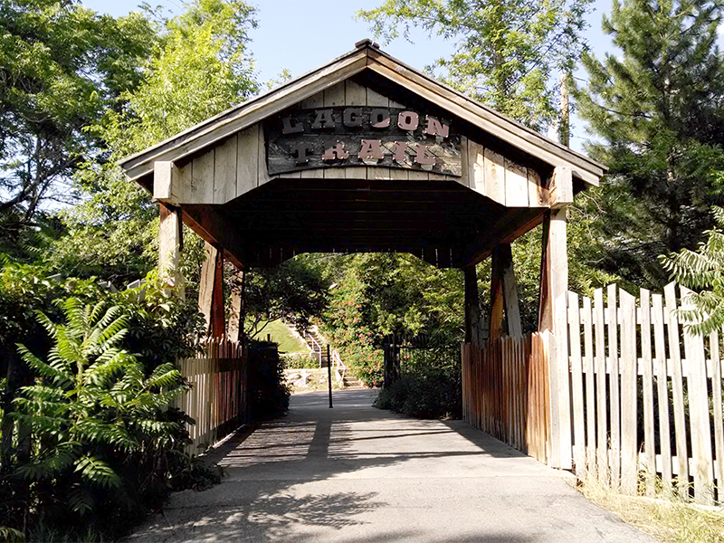 A covered bridge crosses over an employee access road to the park's greenhouse. Photo: B. Miskin