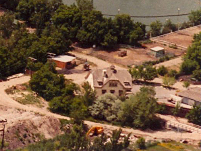 This aerial photo from around 1984 shows the stable and the ride path between the Dern Barn and the trees. The path in the foreground may have been used previously. Photo courtesy of Lagoon