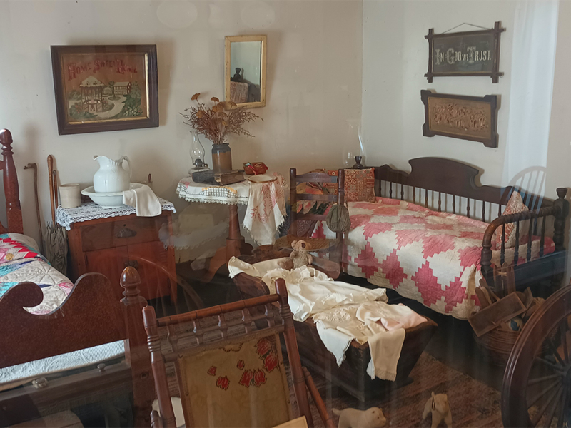 Bedroom display in the Bingham Cabin. Photo: B. Miskin