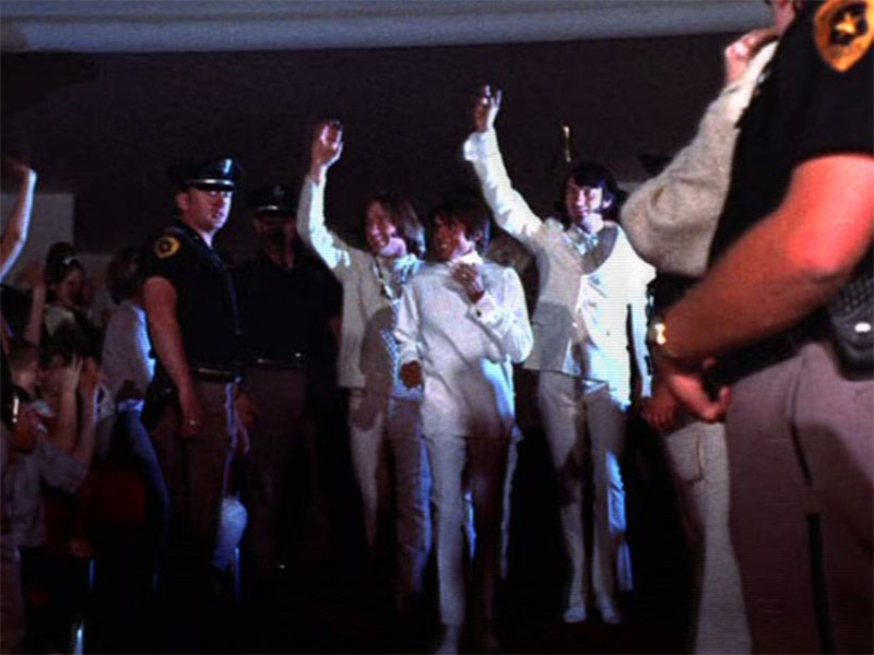 The Monkees entering Valley Music Hall in the movie Head.