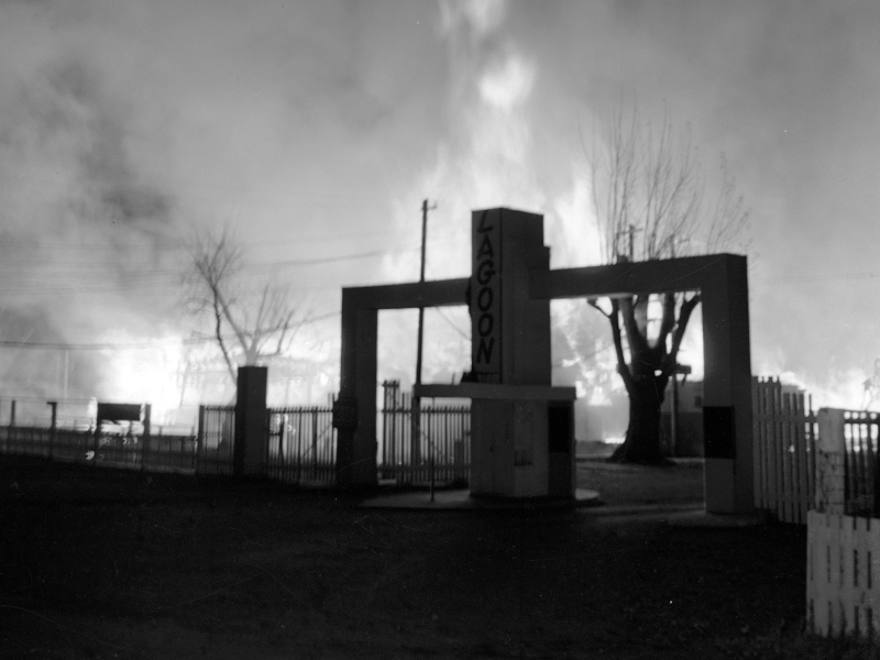 Fire rages behind the auto gate which was just added a few years before in 1947. Photo: J. Willard Marriott Library Special Collections, University Of Utah